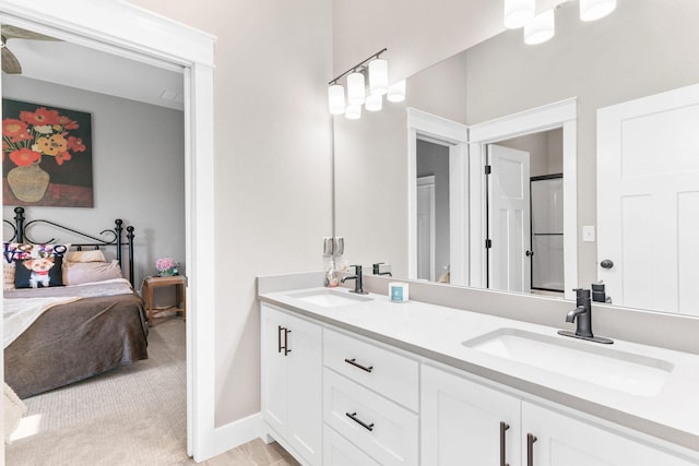 3972 E Dunrobin Dr, Springfield, MO 65809 - bathroom with double vanity and connected bathroom