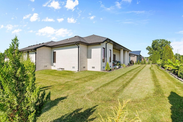3972 E Dunrobin Dr, Springfield, MO 65809 - rear view of house featuring crawl space, brick siding, and a yard