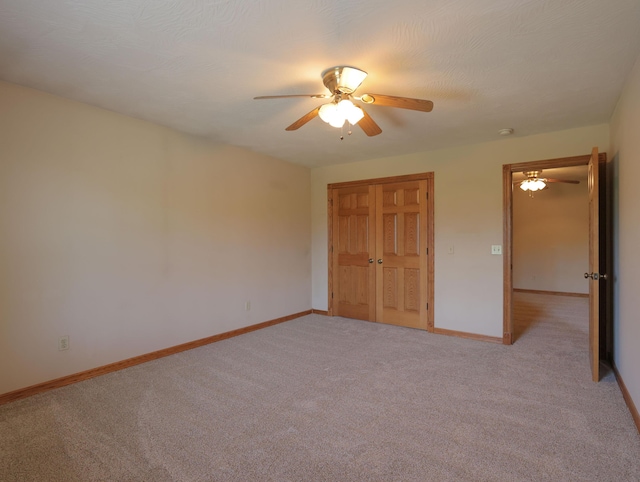 6092 W Farm Rd Unit 114, Springfield, MO 65802 - unfurnished bedroom with light colored carpet, a closet, and ceiling fan