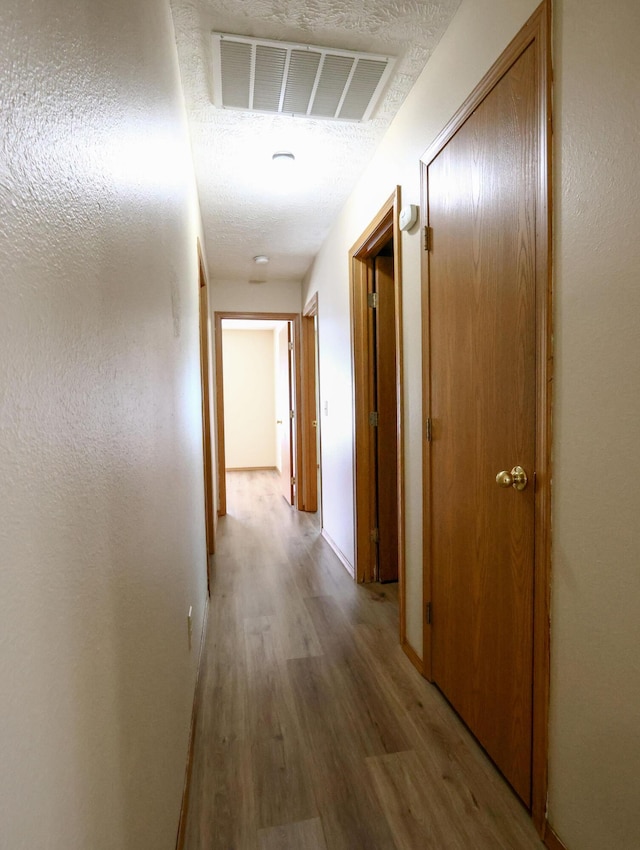 1324 N Forest Ave, Springfield, MO 65802 - corridor with light wood-style flooring