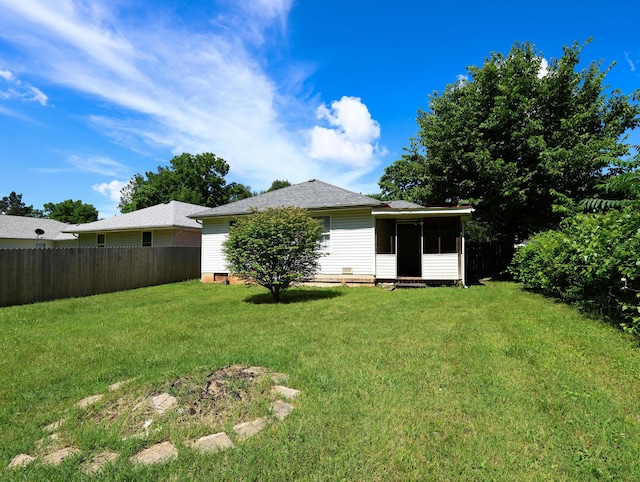 1324 N Forest Ave, Springfield, MO 65802 - back of property with a sunroom, crawl space, and a shingled roof