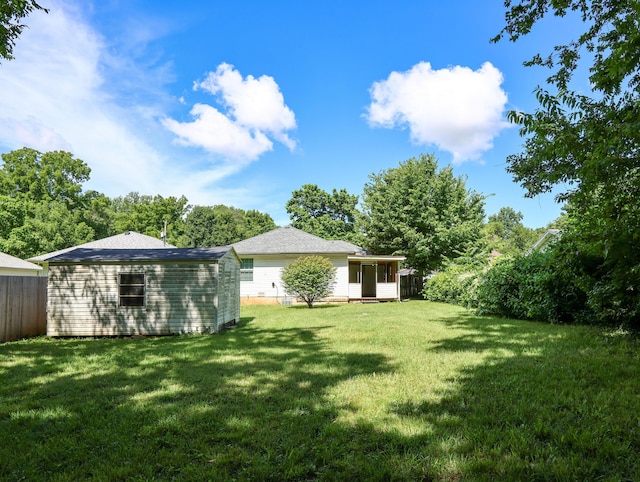 1324 N Forest Ave, Springfield, MO 65802 - view of yard with a sunroom and an outdoor structure