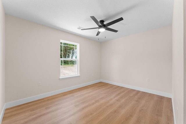 265 Mccann Rd, Powersite, MO 65731 - spare room with light wood-style floors and a ceiling fan