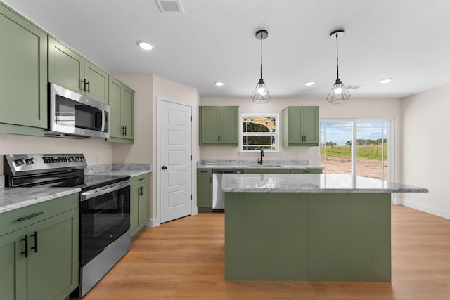 265 Mccann Rd, Powersite, MO 65731 - kitchen with green cabinetry, stainless steel appliances, light wood-type flooring, and recessed lighting
