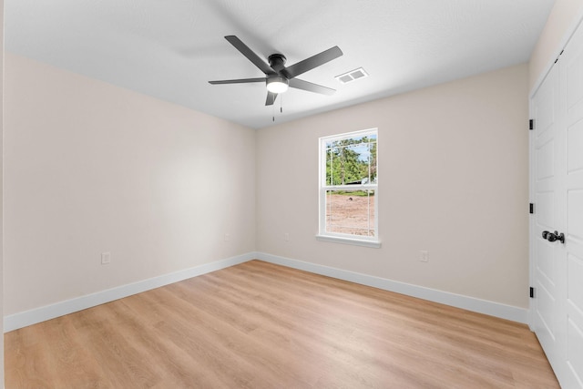 265 Mccann Rd, Powersite, MO 65731 - unfurnished room featuring light wood-style flooring and ceiling fan