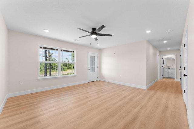 265 Mccann Rd, Powersite, MO 65731 - unfurnished living room featuring light wood-style flooring, a ceiling fan, and recessed lighting