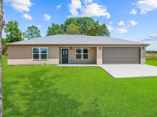 265 Mccann Rd, Powersite, MO 65731 - ranch-style home featuring a front lawn, an attached garage, driveway, and roof with shingles