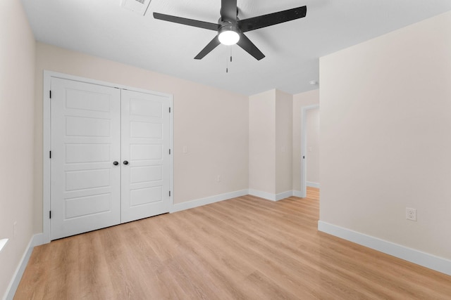 265 Mccann Rd, Powersite, MO 65731 - unfurnished bedroom with light wood-type flooring, a closet, and a ceiling fan