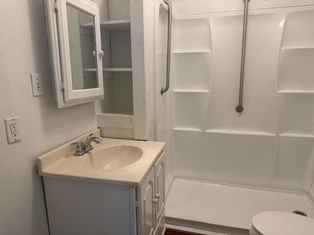 714 W Leyda Ave, West Plains, MO 65775 - bathroom with vanity and a shower