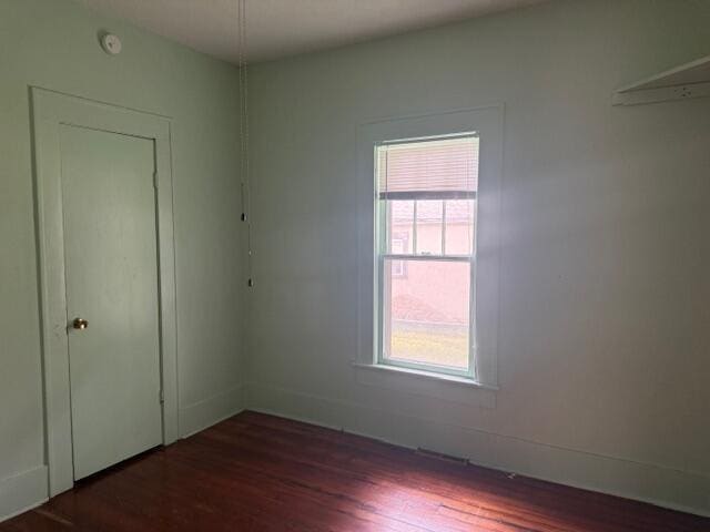 714 W Leyda Ave, West Plains, MO 65775 - spare room with dark wood finished floors