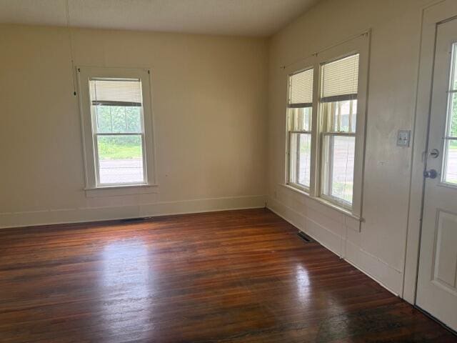 714 W Leyda Ave, West Plains, MO 65775 - empty room with wood finished floors and baseboards