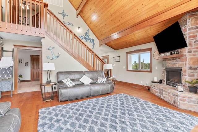 78 Free Bird Ln, Reeds Spring, MO 65737 - living room with stairway, a fireplace, wood finished floors, vaulted ceiling, and wooden ceiling