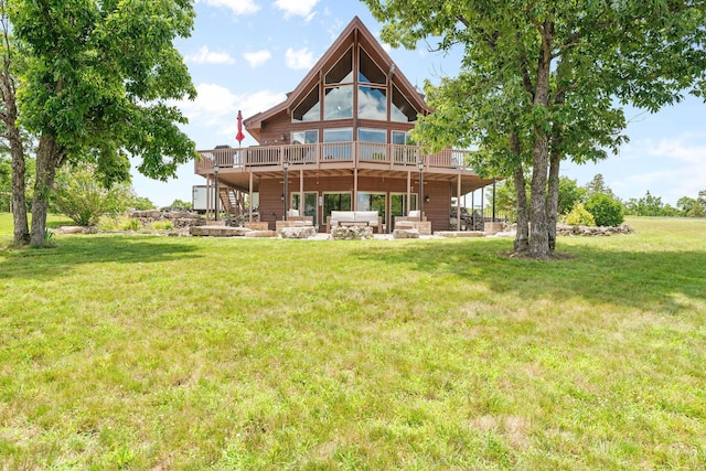 78 Free Bird Ln, Reeds Spring, MO 65737 - back of property with a wooden deck, stairway, a yard, and a patio area