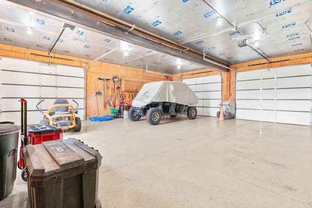 78 Free Bird Ln, Reeds Spring, MO 65737 - garage featuring a garage door opener