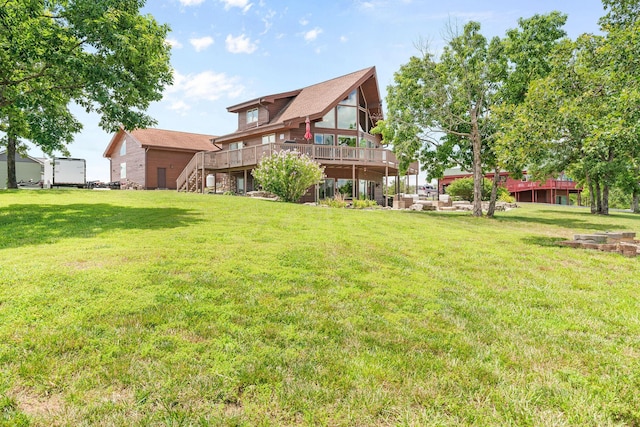 78 Free Bird Ln, Reeds Spring, MO 65737 - rear view of property featuring a wooden deck, stairway, and a yard