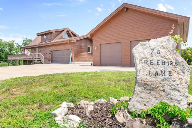 78 Free Bird Ln, Reeds Spring, MO 65737 - view of front of property with driveway and a garage