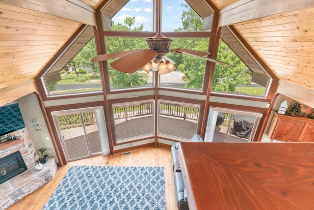 78 Free Bird Ln, Reeds Spring, MO 65737 - living room featuring light wood finished floors, ceiling fan, lofted ceiling, and a fireplace