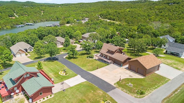 78 Free Bird Ln, Reeds Spring, MO 65737 - aerial view of residential area featuring a forest and a nearby body of water