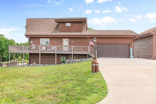 78 Free Bird Ln, Reeds Spring, MO 65737 - view of front of property featuring a garage, driveway, a front yard, and roof with shingles