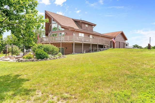 78 Free Bird Ln, Reeds Spring, MO 65737 - back of property featuring a yard, a deck, and a garage