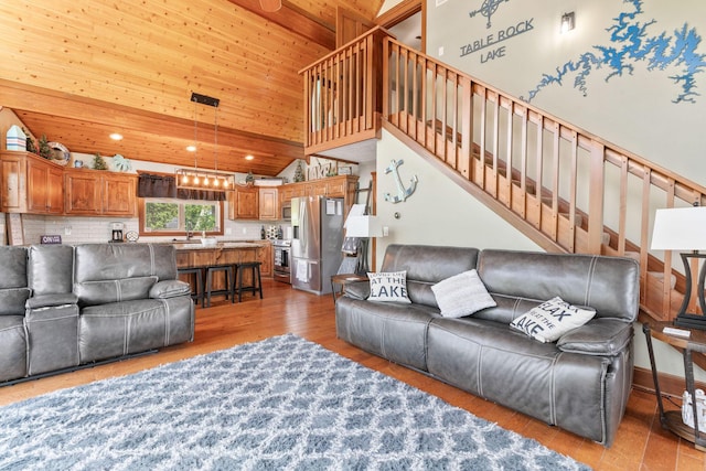 78 Free Bird Ln, Reeds Spring, MO 65737 - living room with stairs, high vaulted ceiling, light wood-type flooring, and recessed lighting