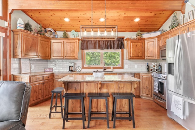 78 Free Bird Ln, Reeds Spring, MO 65737 - kitchen with appliances with stainless steel finishes, wooden ceiling, vaulted ceiling, light wood-type flooring, and a center island