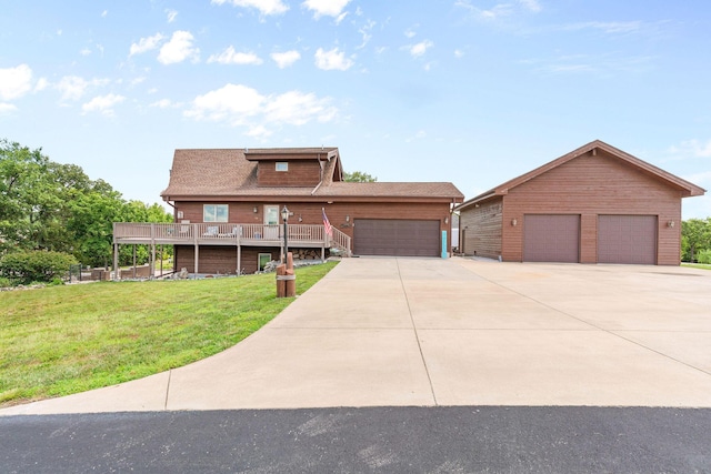 78 Free Bird Ln, Reeds Spring, MO 65737 - view of front facade featuring a front lawn, a garage, and a deck