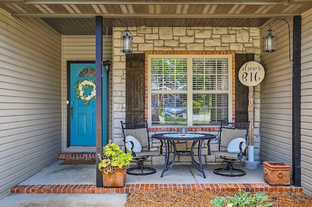 4050 W Page Pl, Springfield, MO 65802 - entrance to property featuring stone siding and covered porch