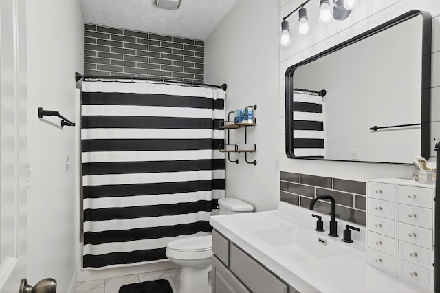 4050 W Page Pl, Springfield, MO 65802 - bathroom with vanity, curtained shower, and marble look tiles