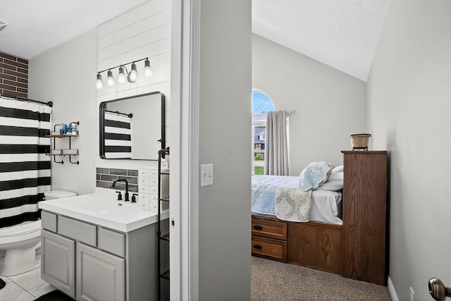 4050 W Page Pl, Springfield, MO 65802 - full bath with vanity, lofted ceiling, and curtained shower