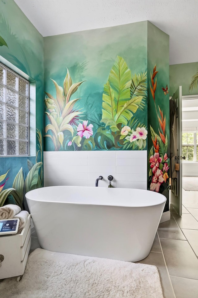 4050 W Page Pl, Springfield, MO 65802 - bathroom featuring a freestanding bath and tile patterned floors