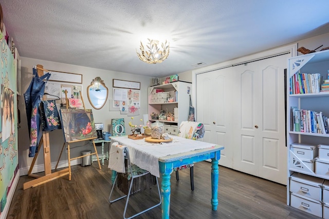 4050 W Page Pl, Springfield, MO 65802 - dining space featuring wood finished floors, a chandelier, and a textured ceiling