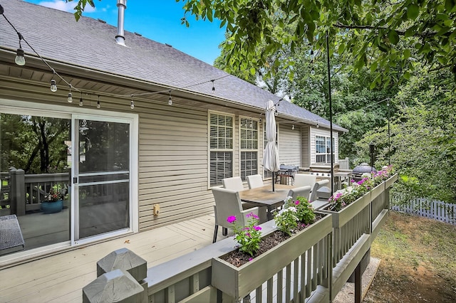 4050 W Page Pl, Springfield, MO 65802 - deck featuring outdoor dining area and grilling area