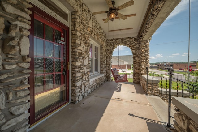 400 S Jefferson St, Neosho, MO 64850 - porch featuring a ceiling fan