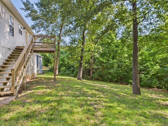 1007 S Walnut St, Harrison, AR 72601 - view of grassy yard featuring stairs and a wooden deck