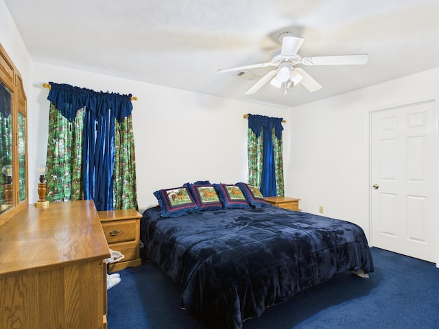1007 S Walnut St, Harrison, AR 72601 - bedroom with carpet floors and a ceiling fan