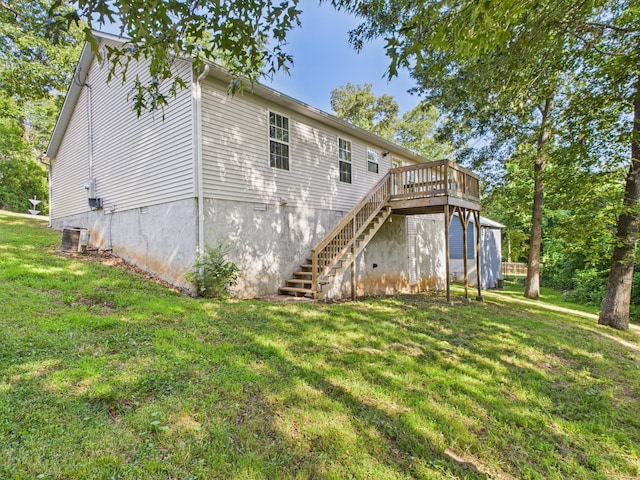 1007 S Walnut St, Harrison, AR 72601 - rear view of property with stairs, a deck, and a yard