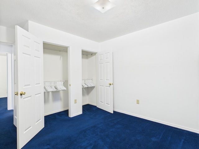 1007 S Walnut St, Harrison, AR 72601 - unfurnished bedroom with dark carpet and a textured ceiling