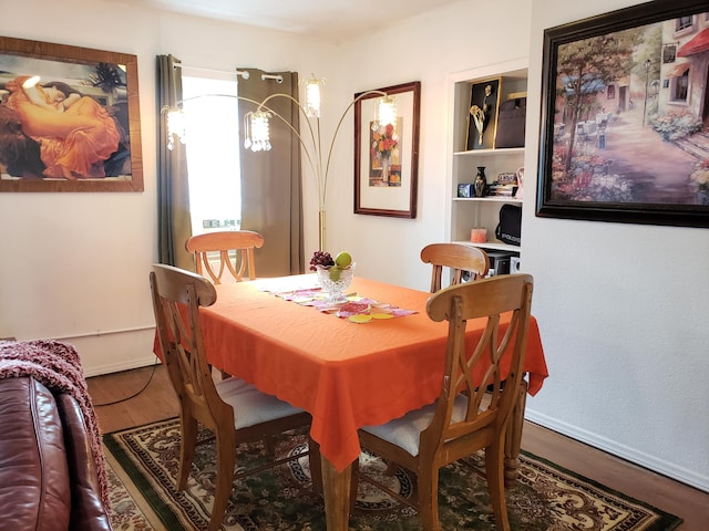 1108 E Cleveland Ave, Monett, MO 65708 - dining area featuring wood finished floors and baseboards