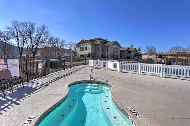 366 Wimbledon Dr Unit 4, Branson, MO 65616 - view of pool featuring a swimming pool, a patio area, and a residential view