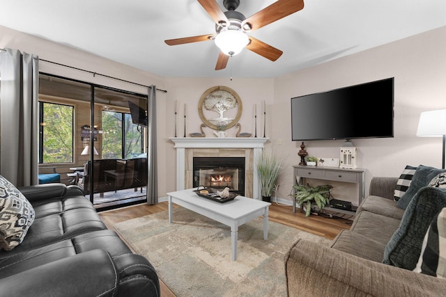 366 Wimbledon Dr Unit 4, Branson, MO 65616 - living room featuring wood finished floors, ceiling fan, and a fireplace