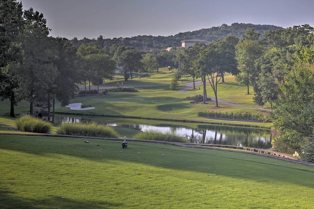 366 Wimbledon Dr Unit 4, Branson, MO 65616 - surrounding community featuring a water view, a lawn, and view of golf course
