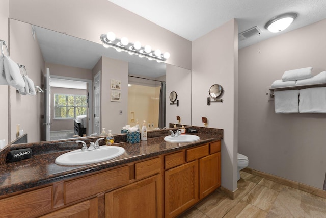 366 Wimbledon Dr Unit 4, Branson, MO 65616 - bathroom featuring double vanity, a shower, and ensuite bathroom