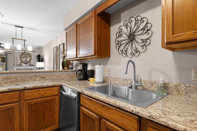 366 Wimbledon Dr Unit 4, Branson, MO 65616 - kitchen featuring stainless steel dishwasher, brown cabinets, light stone counters, and decorative light fixtures