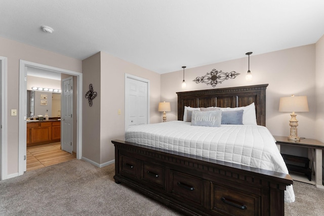 366 Wimbledon Dr Unit 4, Branson, MO 65616 - bedroom with light colored carpet and connected bathroom