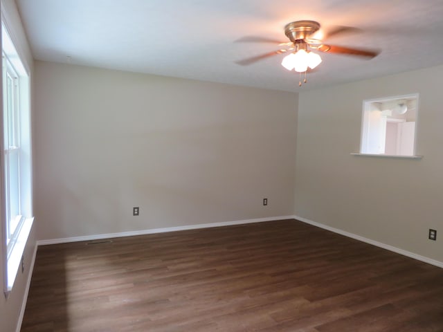 1007 E Parkview St, Ozark, MO 65721 - spare room featuring dark wood-type flooring and a ceiling fan