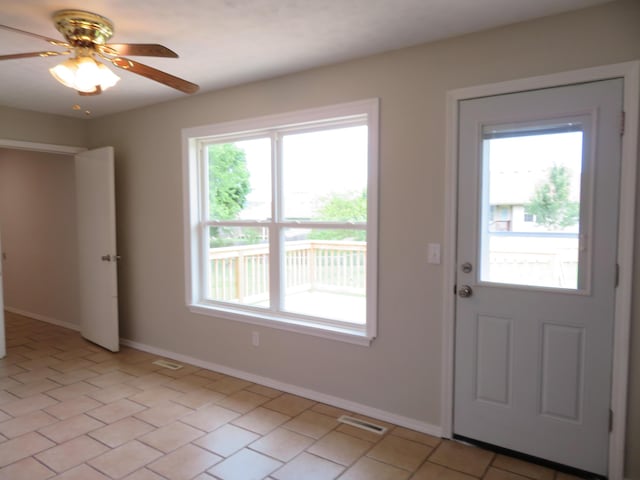 1007 E Parkview St, Ozark, MO 65721 - foyer entrance featuring baseboards and a ceiling fan