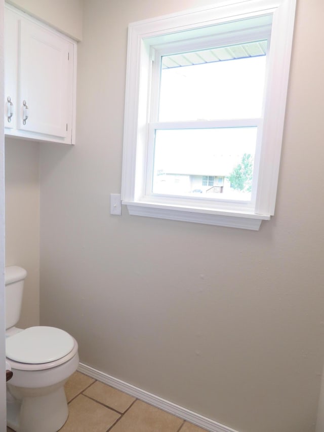 1007 E Parkview St, Ozark, MO 65721 - bathroom featuring baseboards and tile patterned floors