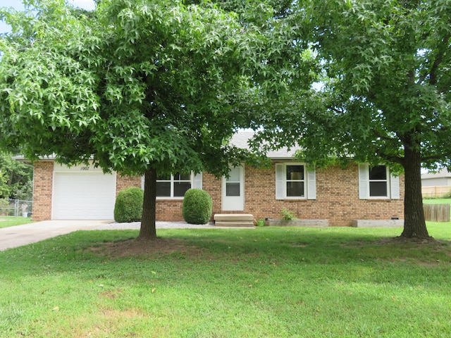 1007 E Parkview St, Ozark, MO 65721 - obstructed view of property featuring brick siding, an attached garage, driveway, and crawl space
