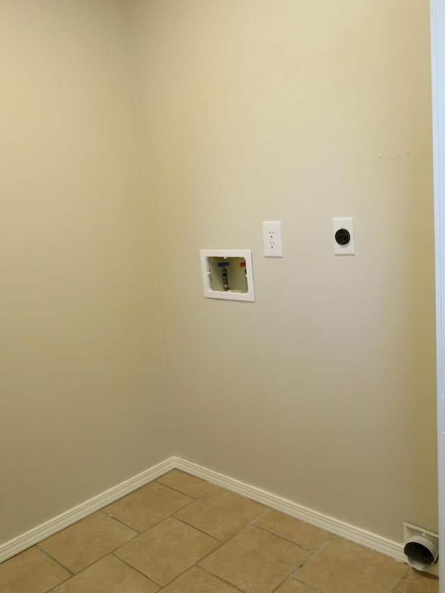 1007 E Parkview St, Ozark, MO 65721 - laundry room with washer hookup, electric dryer hookup, and light tile patterned floors